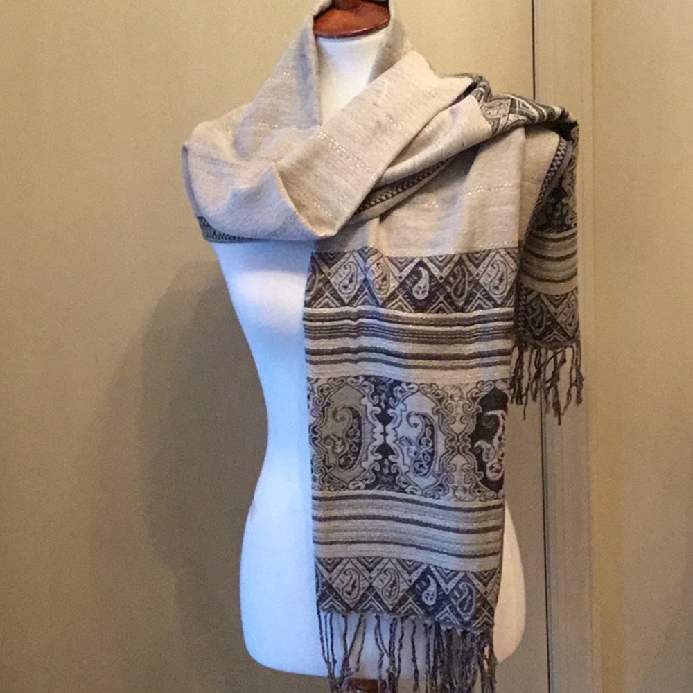 Wrap w/fringe,reversible,shades of brown & beige, can be elegant or casual